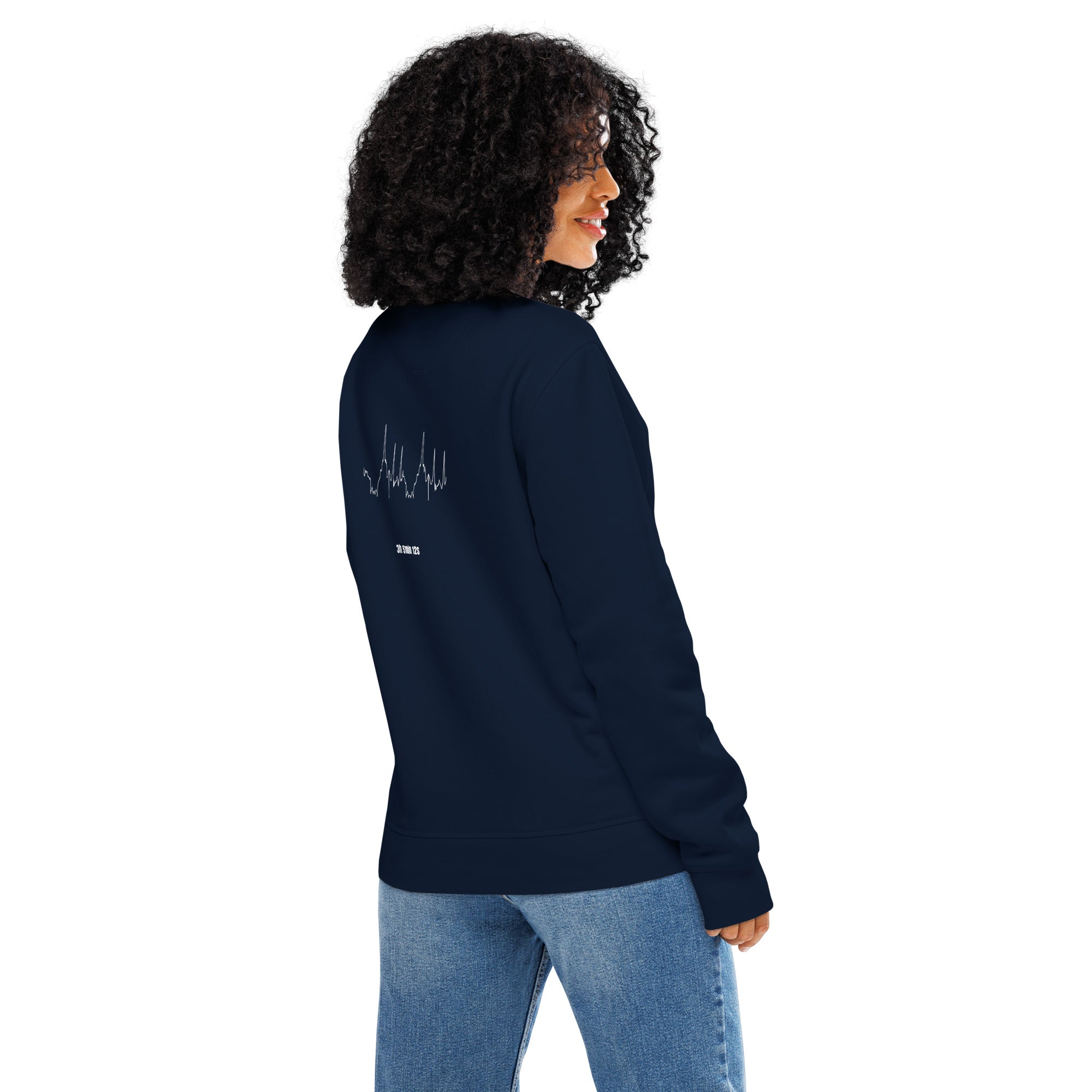 Person wearing a navy blue sweatshirt with custom Strava route print art on the back, standing against a white background