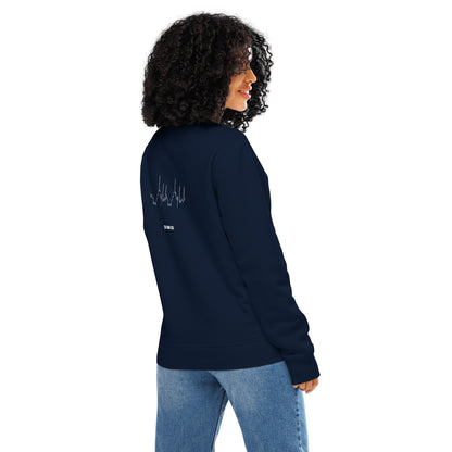 Person wearing a navy blue sweatshirt with custom Strava route print art on the back, standing against a white background