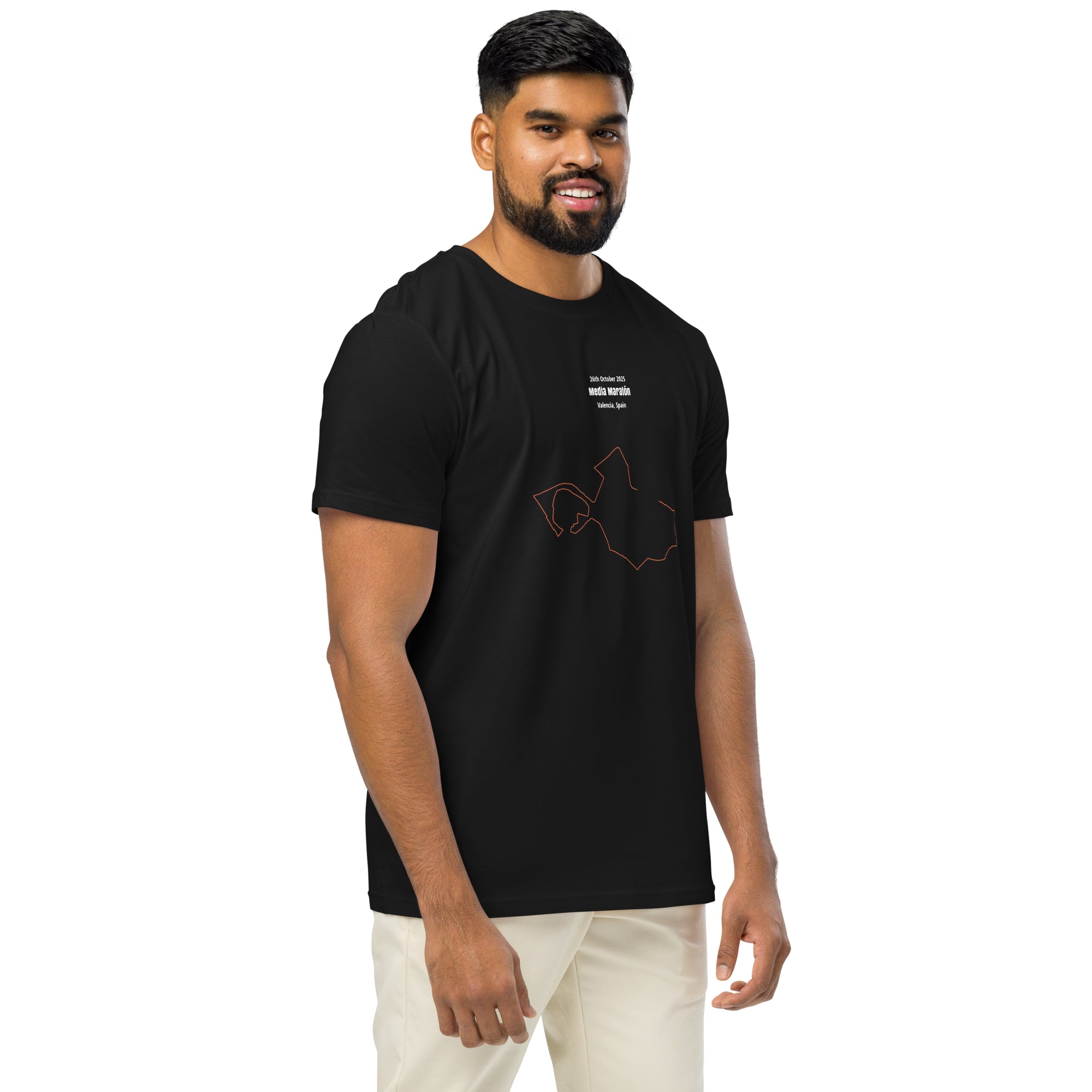 Man wearing a black t-shirt with a custom Strava route print art on a white background