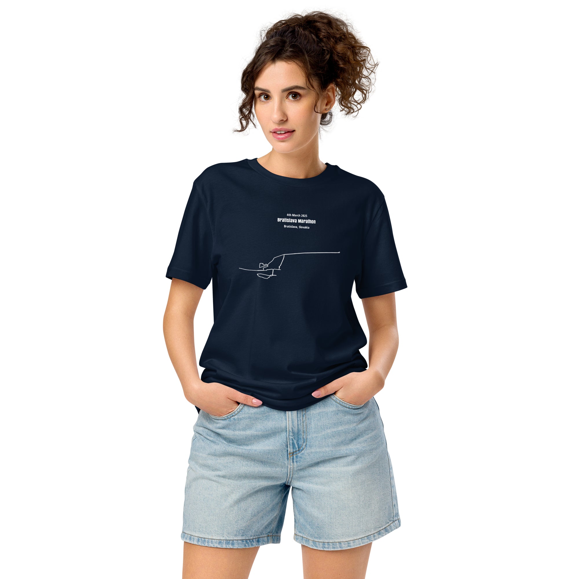 Woman wearing a navy blue t-shirt with a custom Strava route print art design on a white background