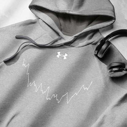 Gray hoodie with Under Armour logo and custom Strava route print design, paired with headphones