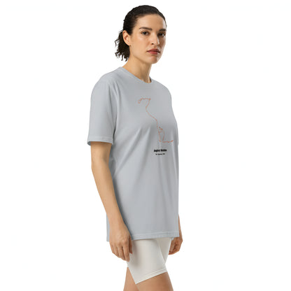 Woman wearing a gray t-shirt with a custom Strava route print design on a white background