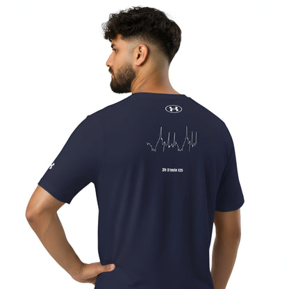 Man wearing a navy blue t-shirt with a logo and custom Strava route print on the back, standing against a white background