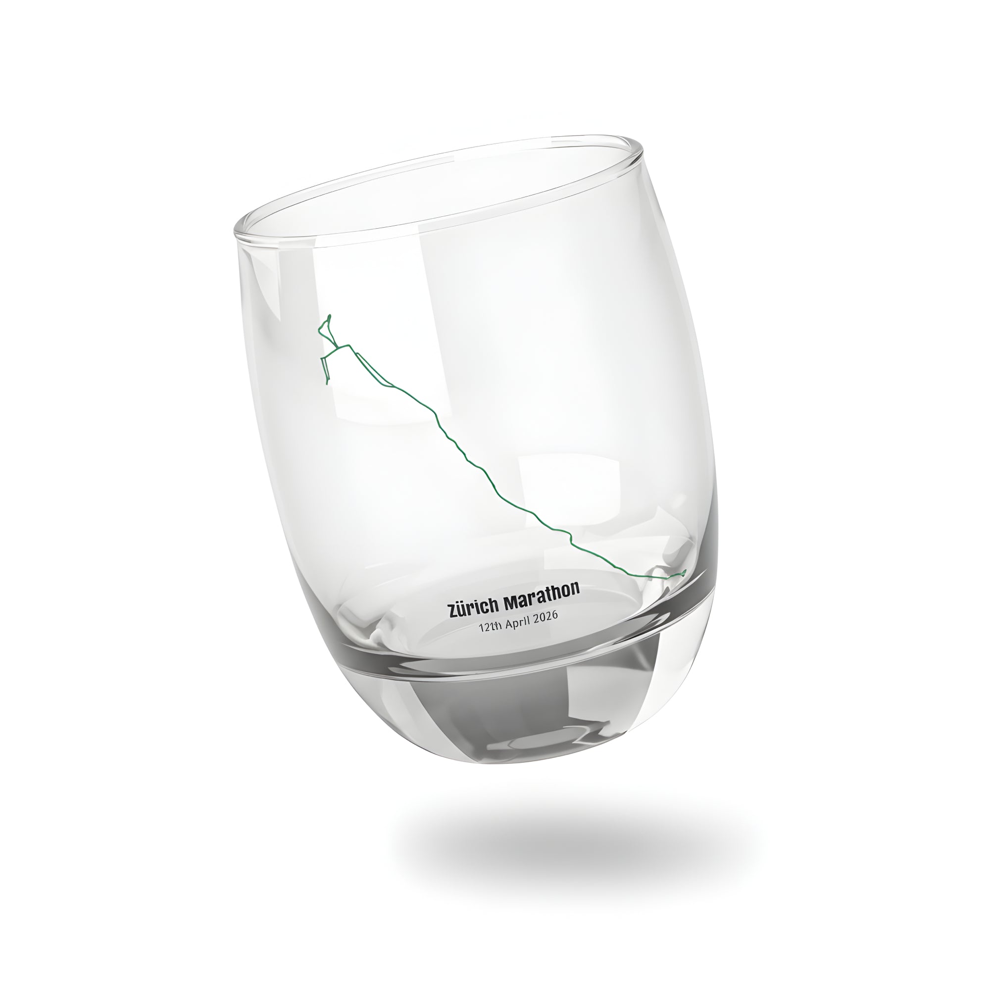 Clear glass tumbler with a printed custom Strava route art design on a white background