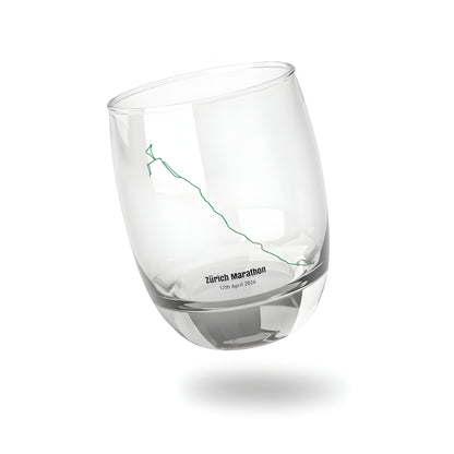 Clear glass tumbler with a printed custom Strava route art design on a white background