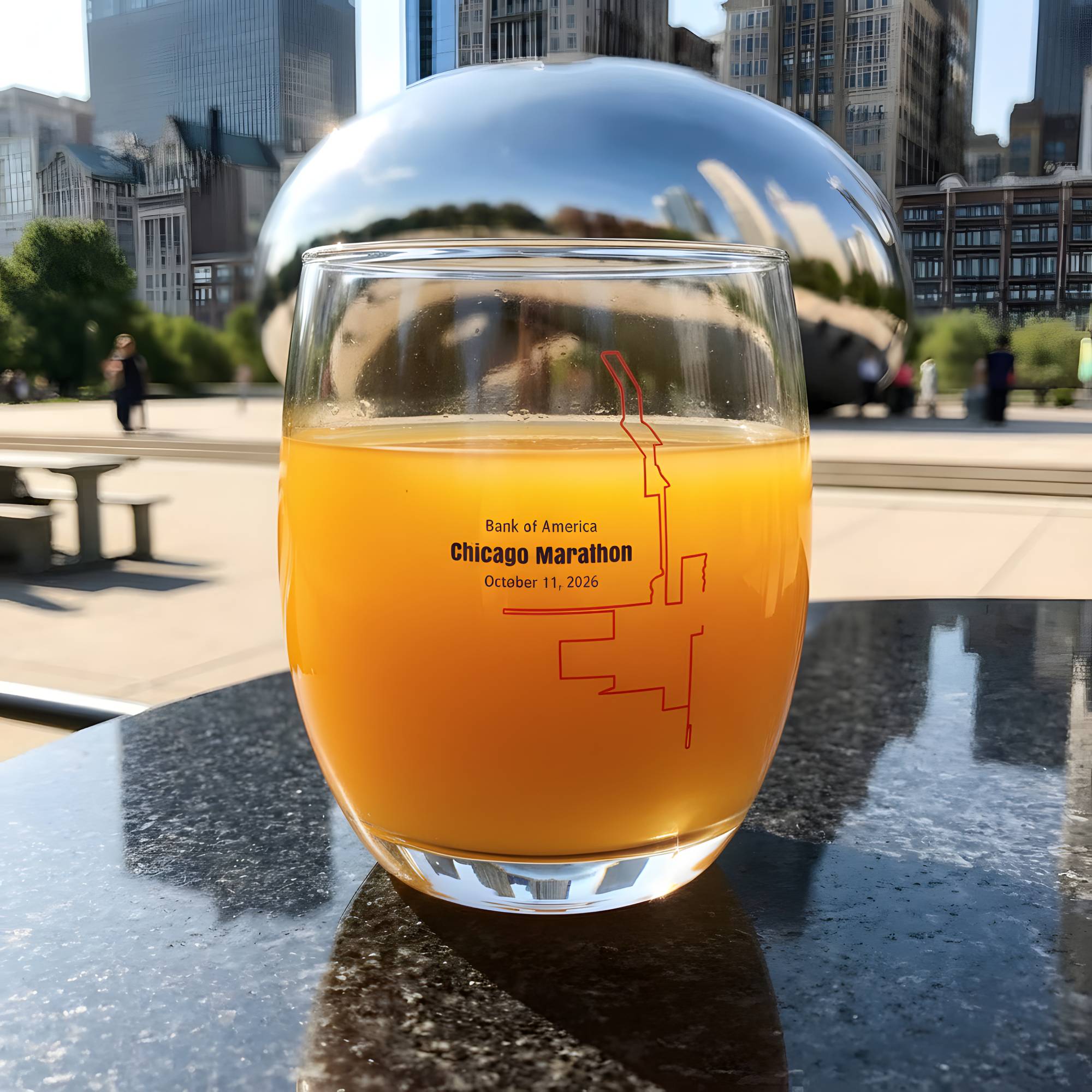 Glass of orange juice with marathon custom Strava route print art design in a Chicago setting