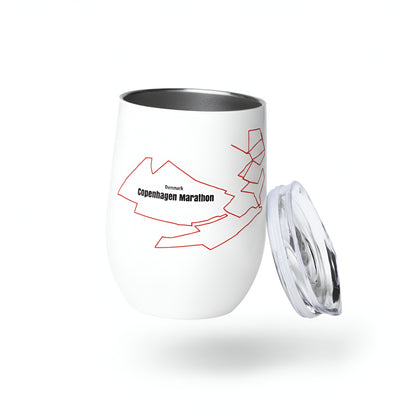 White tumbler with red custom Strava route print art design and black text on a white background
