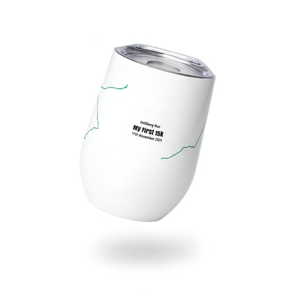 White insulated tumbler with text and custom Strava route print art on a white background