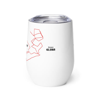 White tumbler with red and black custom Strava route print art design on a white background