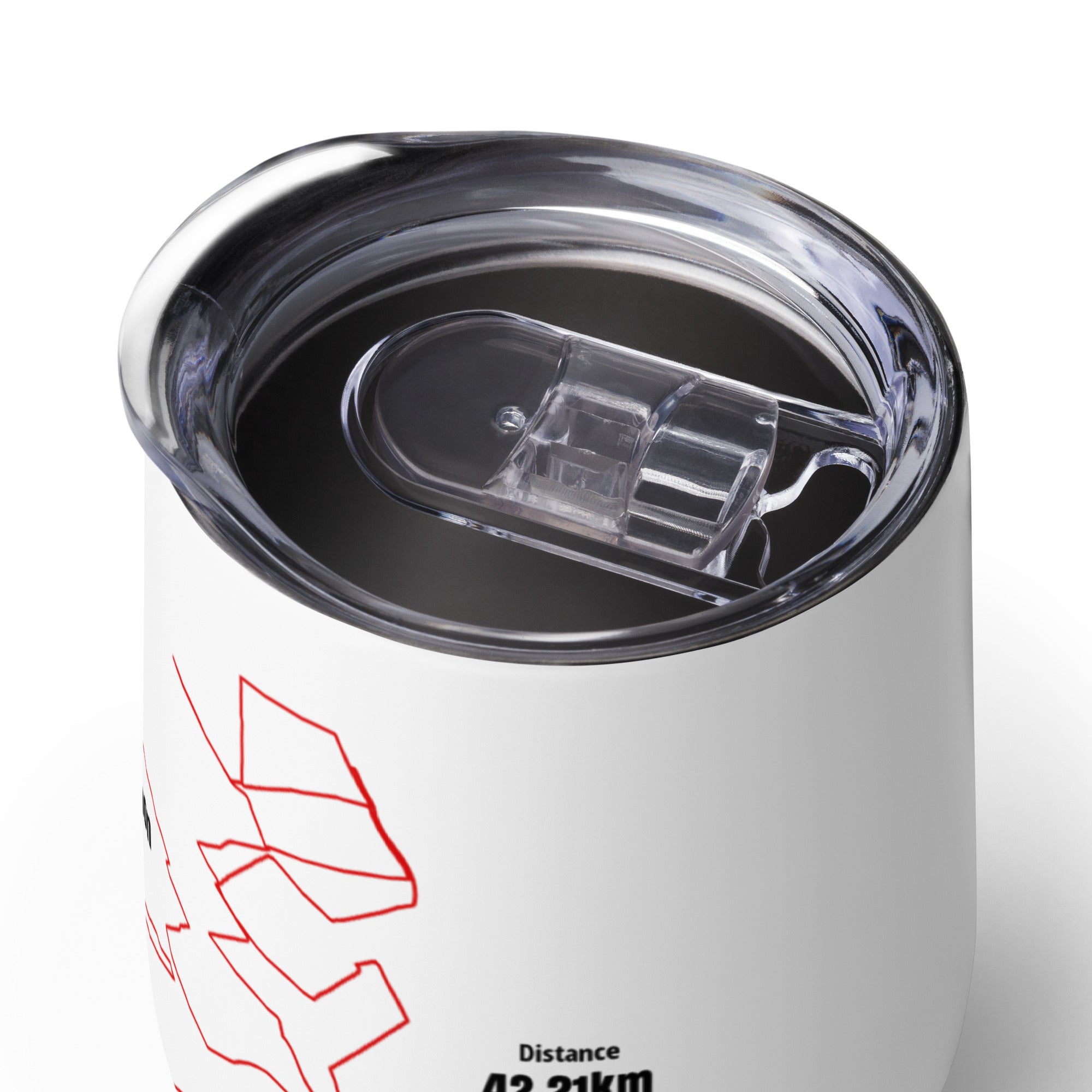 White tumbler with red custom Strava route print art design and clear lid on a white background